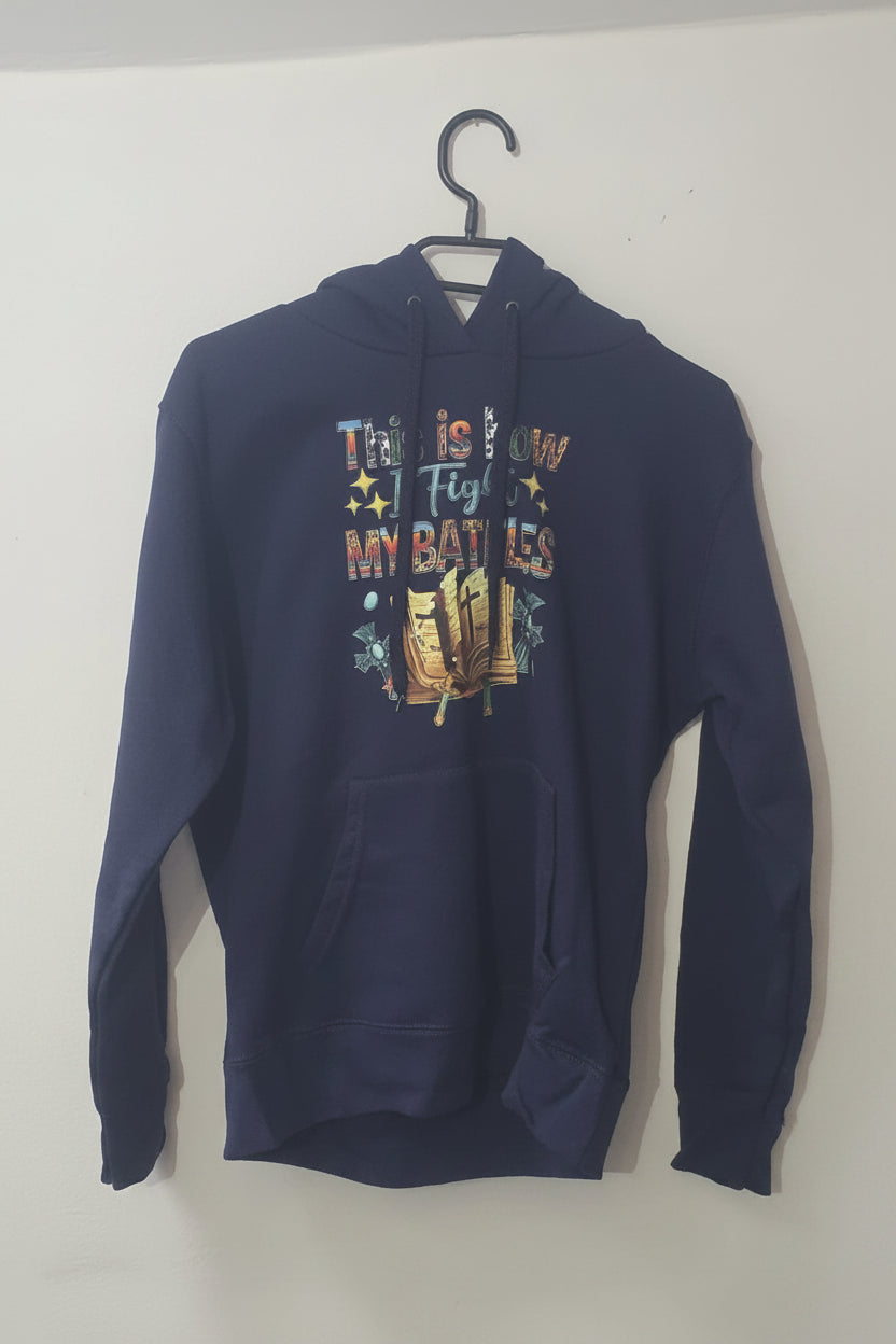 This Is How I Fight My Battles Navy Hoodie – Front view with multicolour scripture graphic